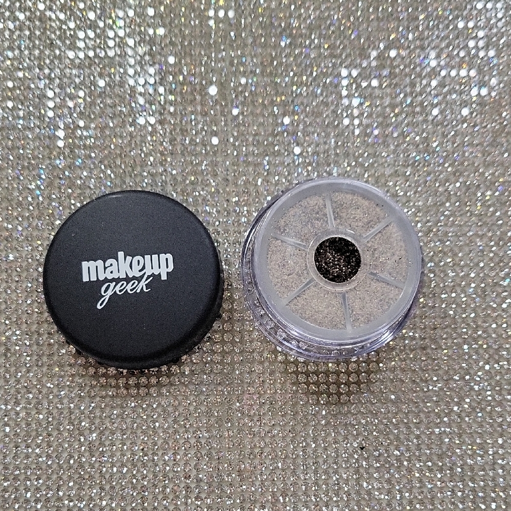 Makeup Geek UTOPIA - warm-toned, dark brown with a glitter finish